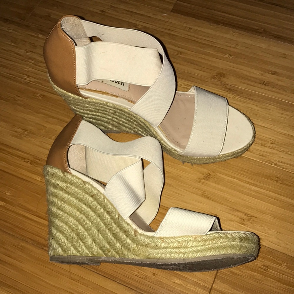 Beige and tan straw wedges